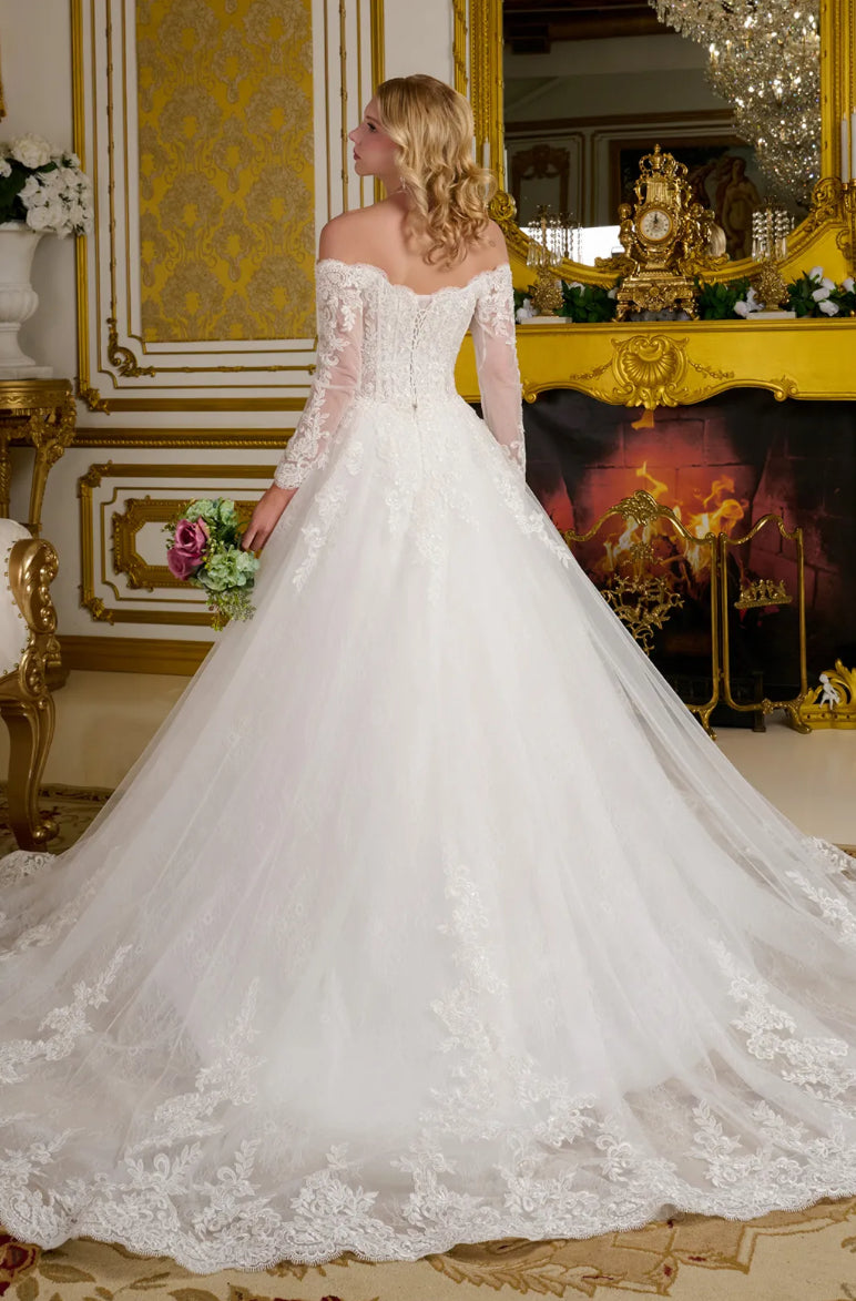 This elegant wedding gown showcases a wide V-neckline that transitions into romantic off-the-shoulder sleeves. GL3653 GLS BY GLORIA