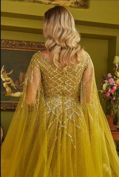 Feel glamorous in this bead, jewel, and sequin adorned dress. GL3606 GLS BY GLORIA