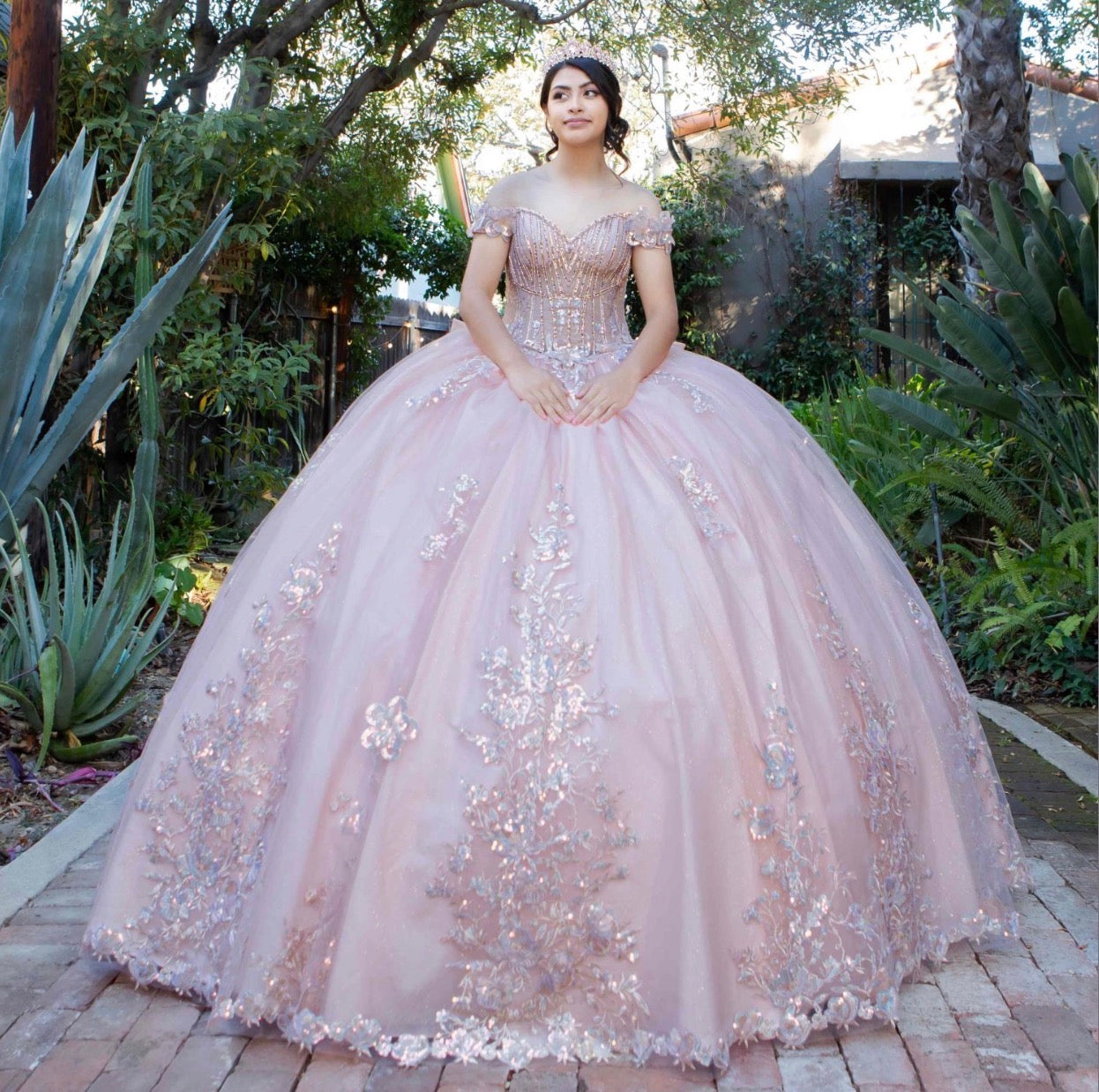 embellished off-the-shoulder straps that frame a flattering V-neckline corset bodice.8370J BY CINDERELLA COUTURE