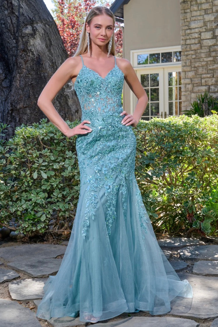 Elegant and alluring, this floor-length trumpet gown. GL3692 BY ELIZABETH K