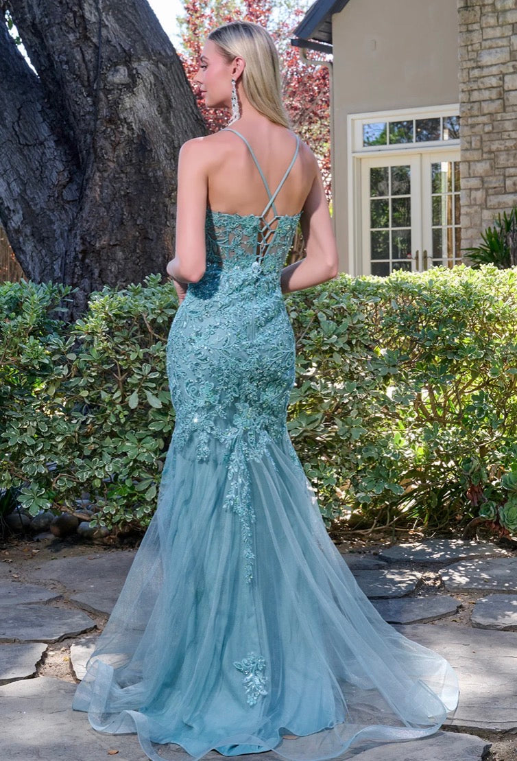 Elegant and alluring, this floor-length trumpet gown. GL3692 BY ELIZABETH K