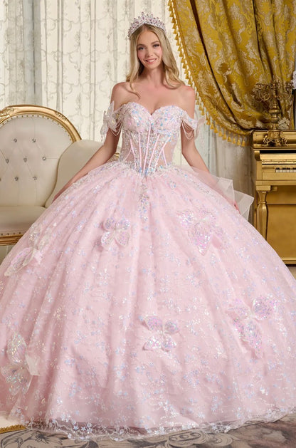 This stunning ball gown is adorned with shimmering 3D butterfly appliqués. GL3651 by Elizabeth K