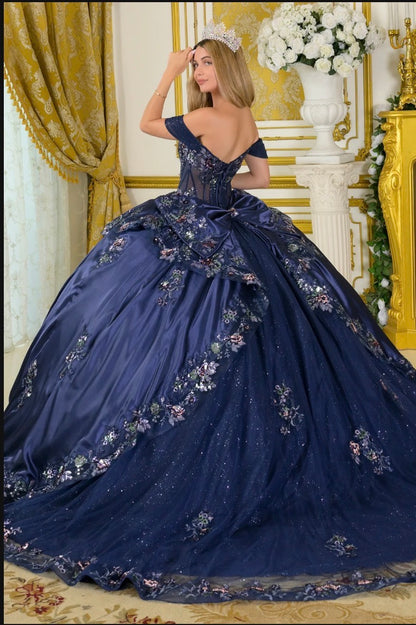 This quinceañera ball gown features a classic silhouette enhanced by refined details and luxurious fabrics. GL3793 BY ELIZABETH K