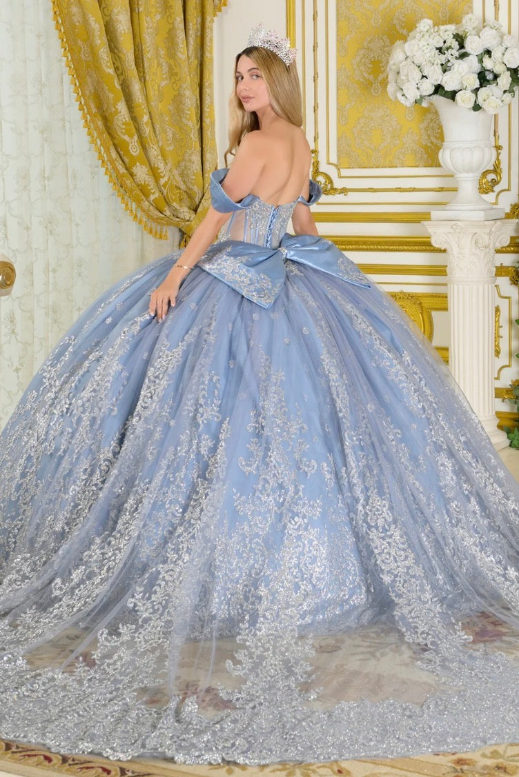 This quinceañera ball gown showcases subtle satin accents. GL3795 BY ELIZABETH K
