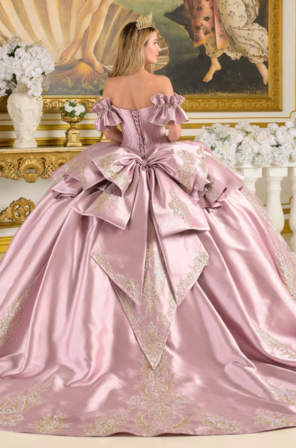 This quinceañera ball gown features off-shoulder ruffle cuff sleeves that frame a V-neckline corset bodice. GL3803 BY ELIZABETH K