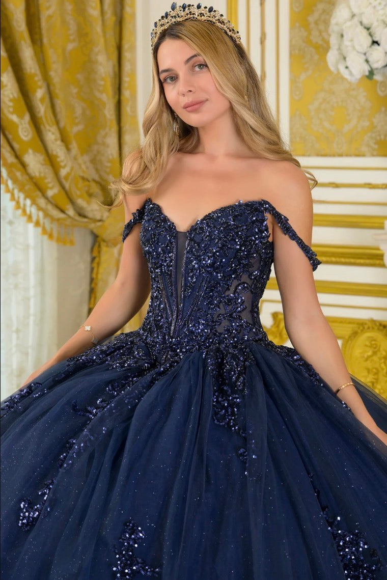 This dazzling ball gown is adorned with intricate bead and sequin. GL3712 BY ELIZABETH K