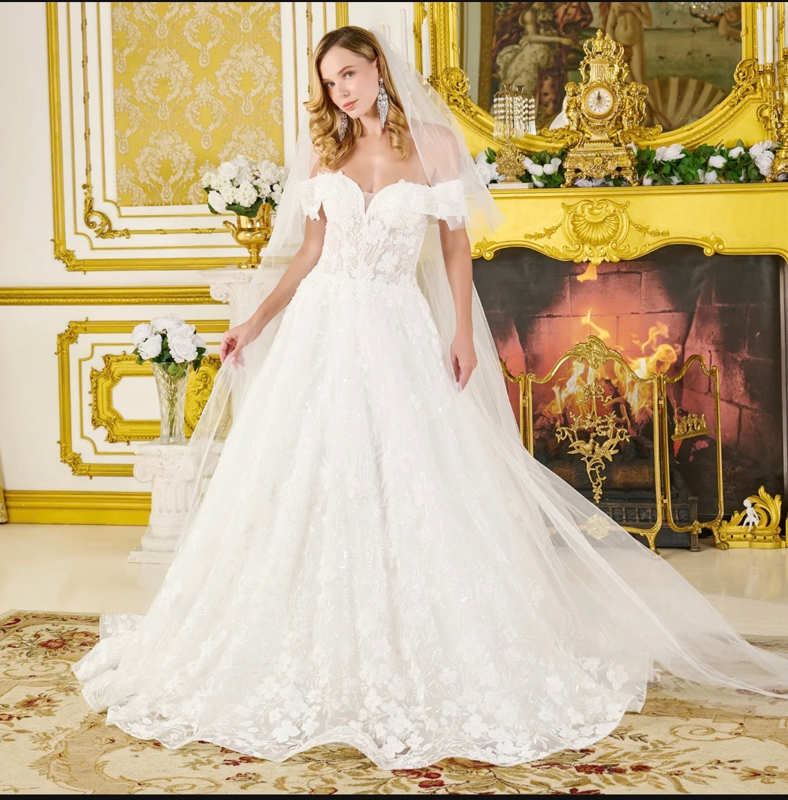 Timeless elegance meets modern sparkle in this stunning ball gown wedding dress. GL3821 GLS BY GLORIA