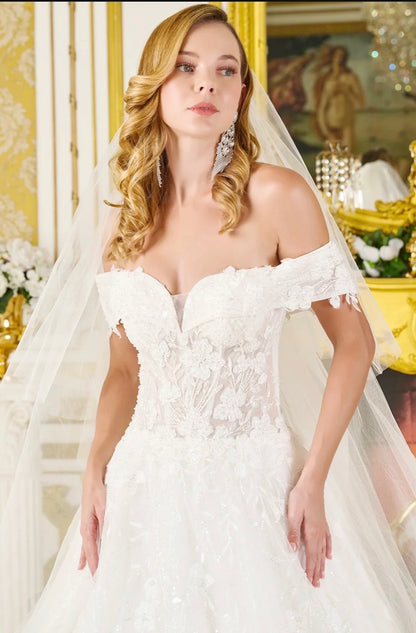 Timeless elegance meets modern sparkle in this stunning ball gown wedding dress. GL3821 GLS BY GLORIA