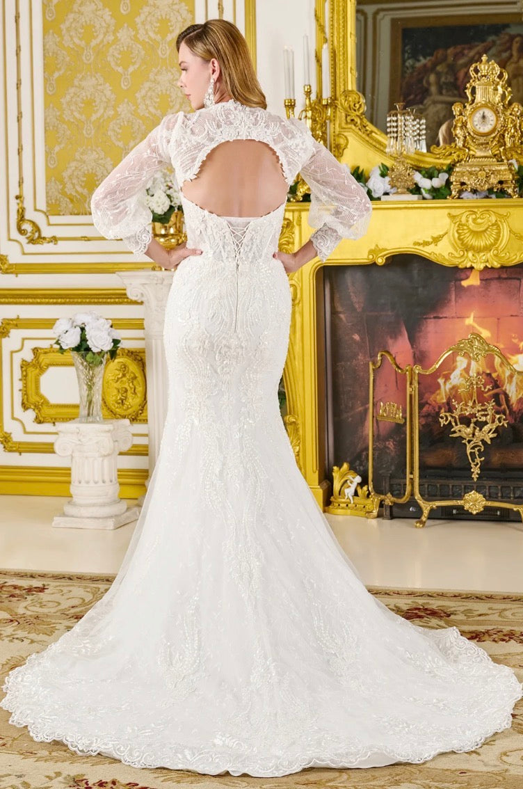 Walk the aisle in this exquisite trumpet silhouette wedding gown. GL3826 BY GLORIA