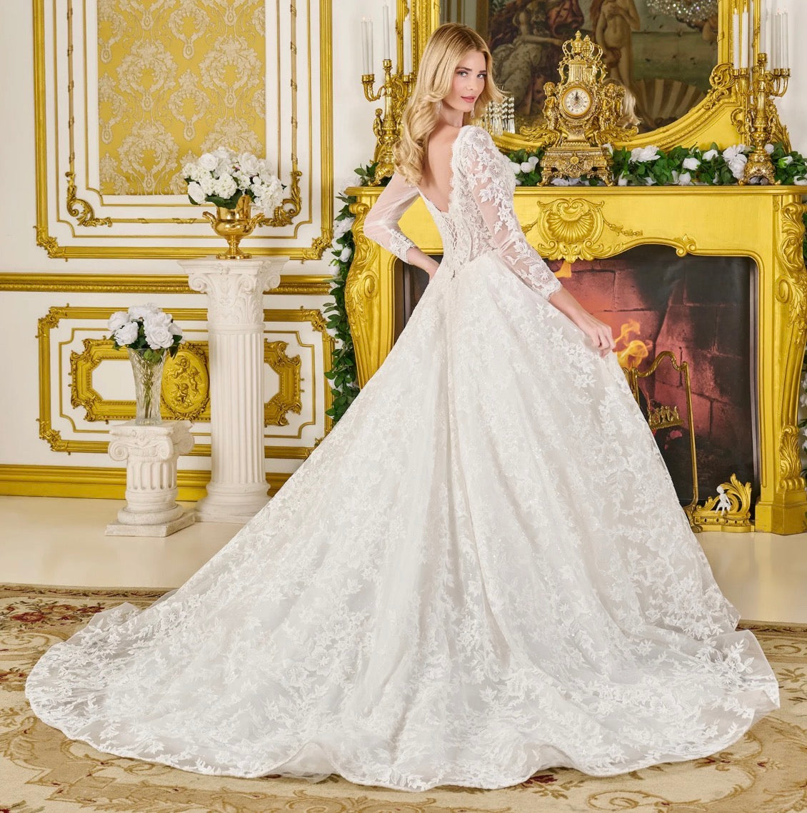 Radiate elegance in this breathtaking wedding gown. GL3819 GLS BY GLORIA