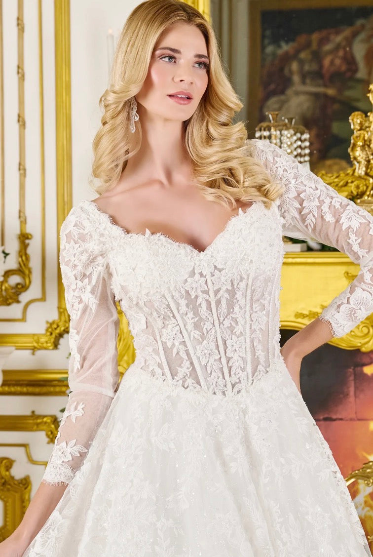 Radiate elegance in this breathtaking wedding gown. GL3819 GLS BY GLORIA