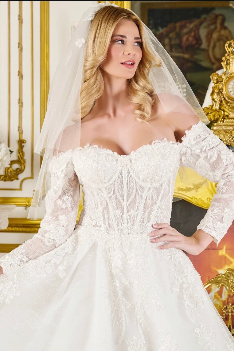 Capture timeless romance in this exquisite wedding ball gown. GL3824 GLS BY GLORIA