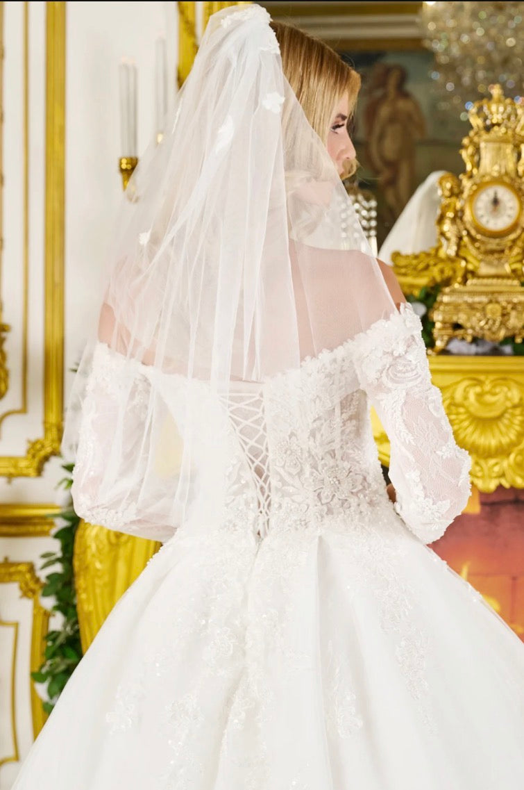 Capture timeless romance in this exquisite wedding ball gown. GL3824 GLS BY GLORIA