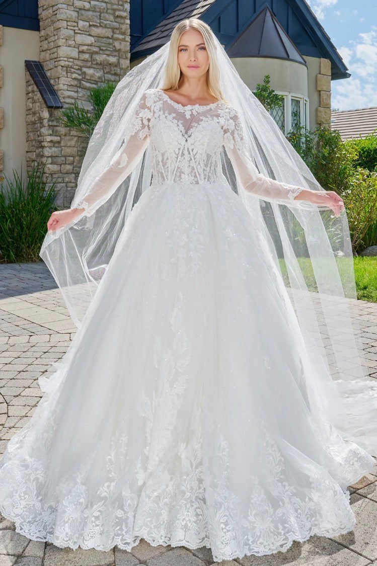 This elegant, wedding ball gown combines modest design. GL3823 GLS BY GLORIA