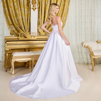 Designed for the bride who loves a clean and sophisticated look, this taffeta wedding gown. GL3718 GLS BY GLORIA