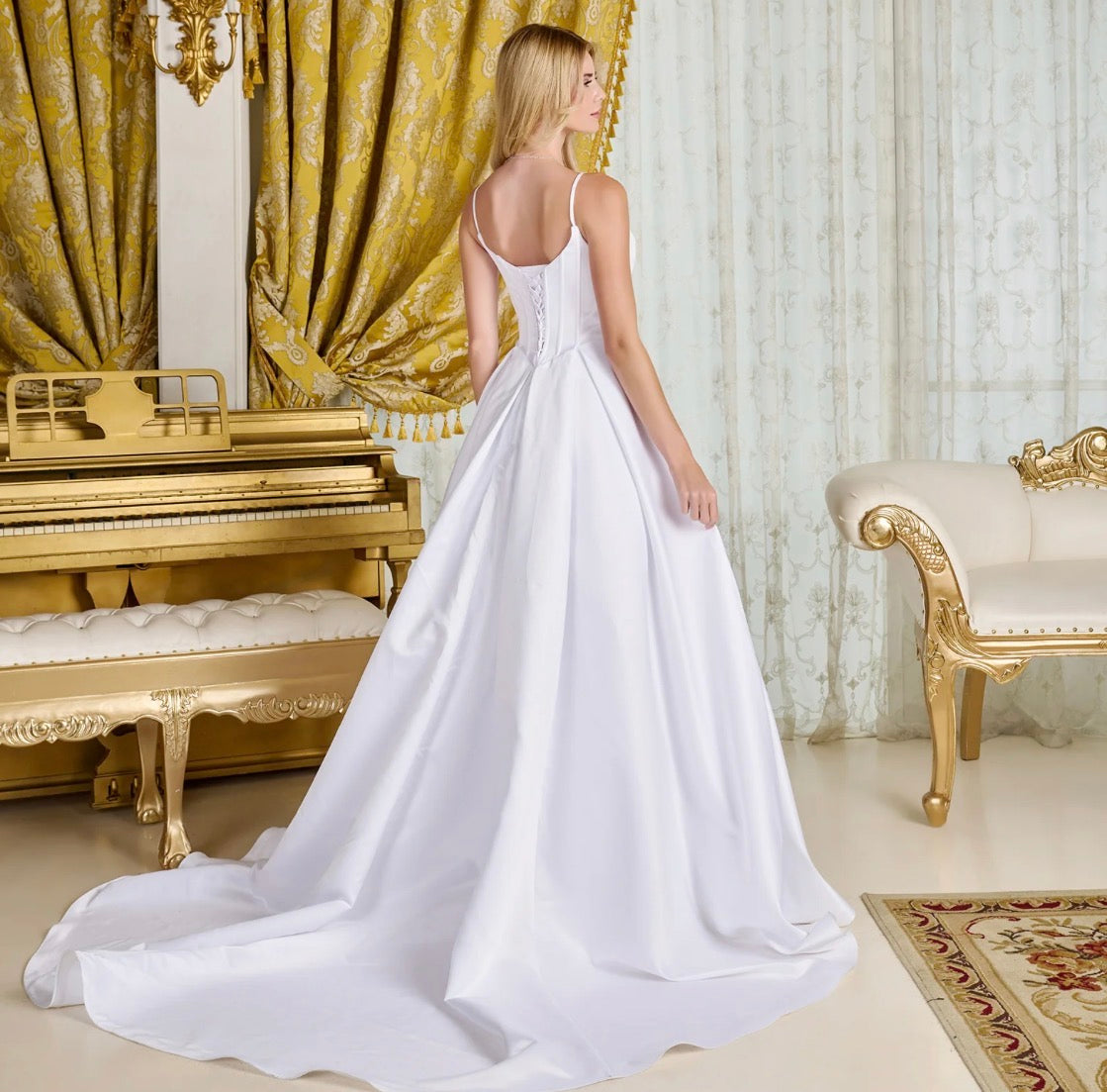 Understated elegance defines this minimalist A-line, satin wedding gown.  GL3716 BY GLORIA