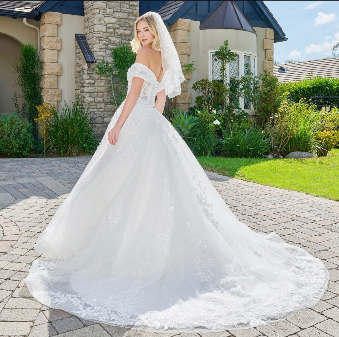 Celebrate your love story in this enchanting ball gown. GL3822 BY GLS BY GLORIA