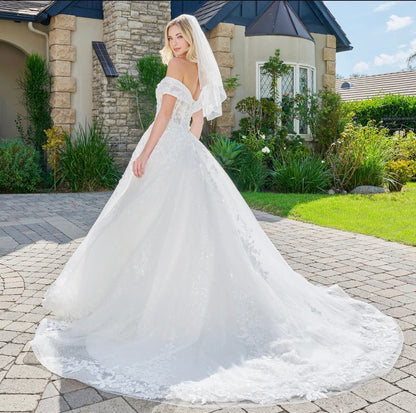 Celebrate your love story in this enchanting ball gown. GL3822 BY GLS BY GLORIA