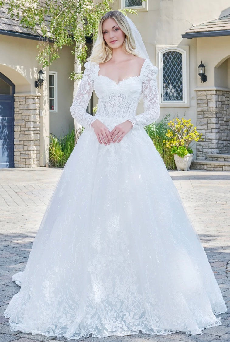 This elegant ball gown wedding dress features a V-neckline. GL3820 GLS BY GLORIA