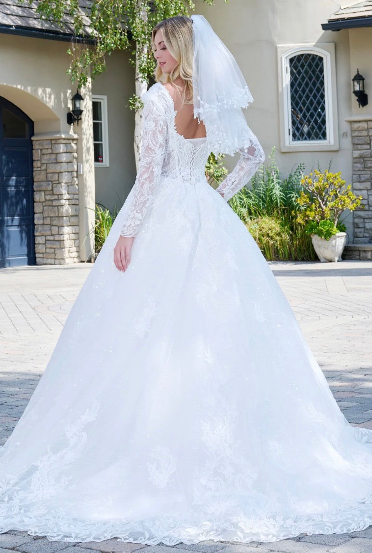 This elegant ball gown wedding dress features a V-neckline. GL3820 GLS BY GLORIA