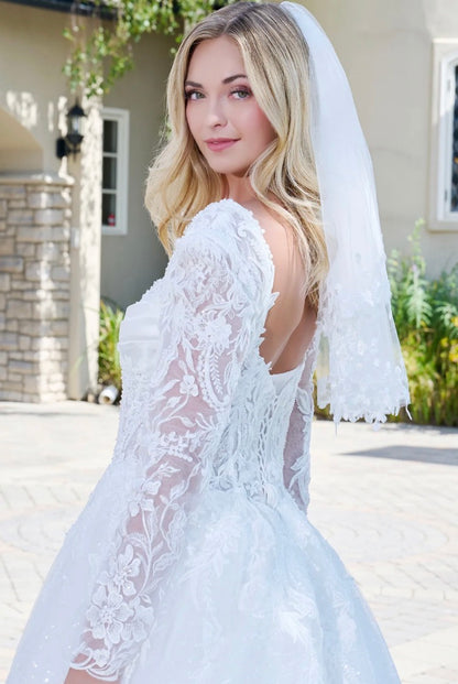 This elegant ball gown wedding dress features a V-neckline. GL3820 GLS BY GLORIA
