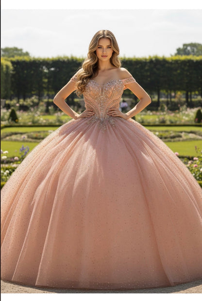 Stunning Rose gold beaded bodice and luminous rhinestones skirt.  PQ1112 BY BELLA COUTURE