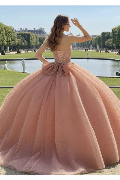 Stunning Rose gold beaded bodice and luminous rhinestones skirt.  PQ1112 BY BELLA COUTURE