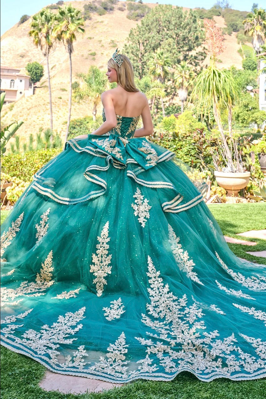 Make a breathtaking entrance in this enchanting strapless quinceañera ball gown. GL3671 BY Elizabeth K