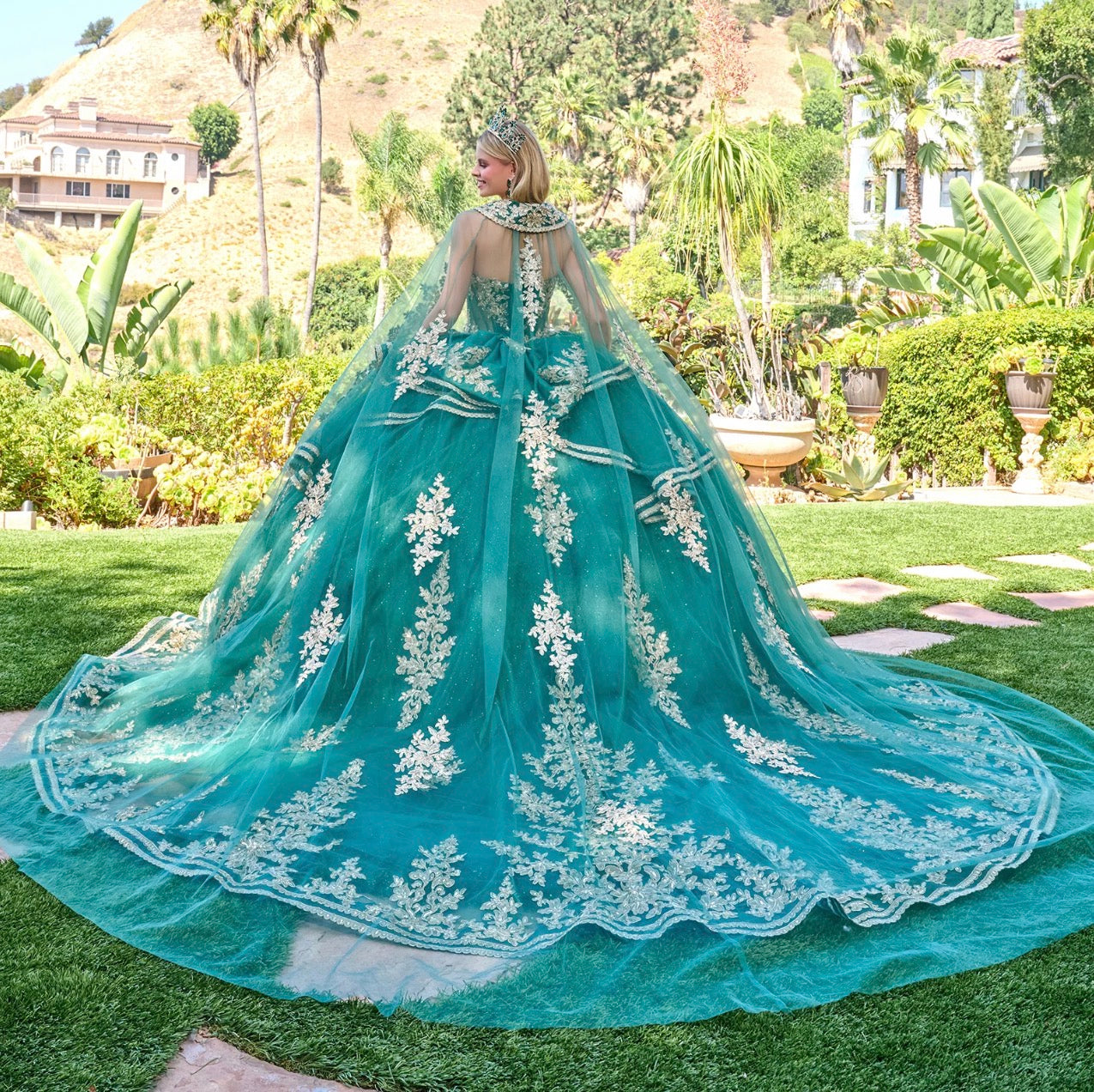 Make a breathtaking entrance in this enchanting strapless quinceañera ball gown. GL3671 BY Elizabeth K