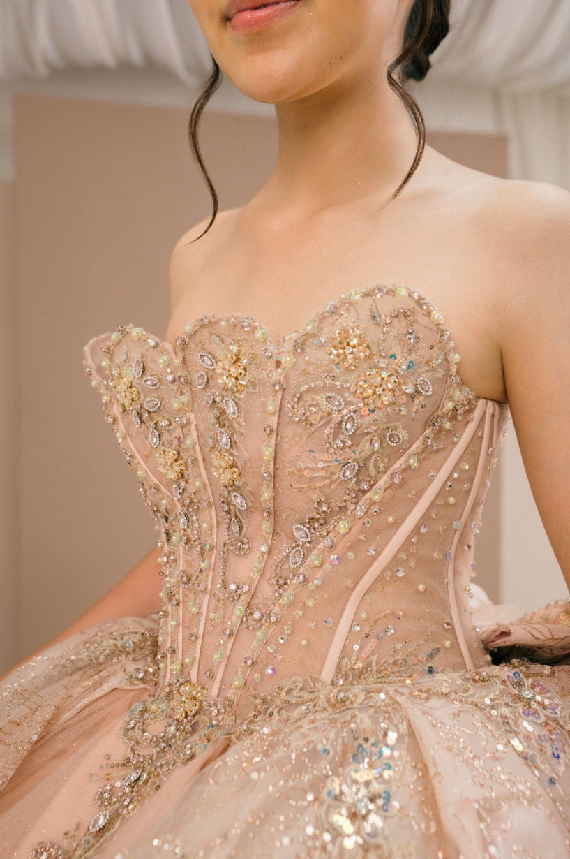 This breathtaking Quinceanera gown is designed to make a grand entrance. 8590JQ BY CIDERELLA COUTURE