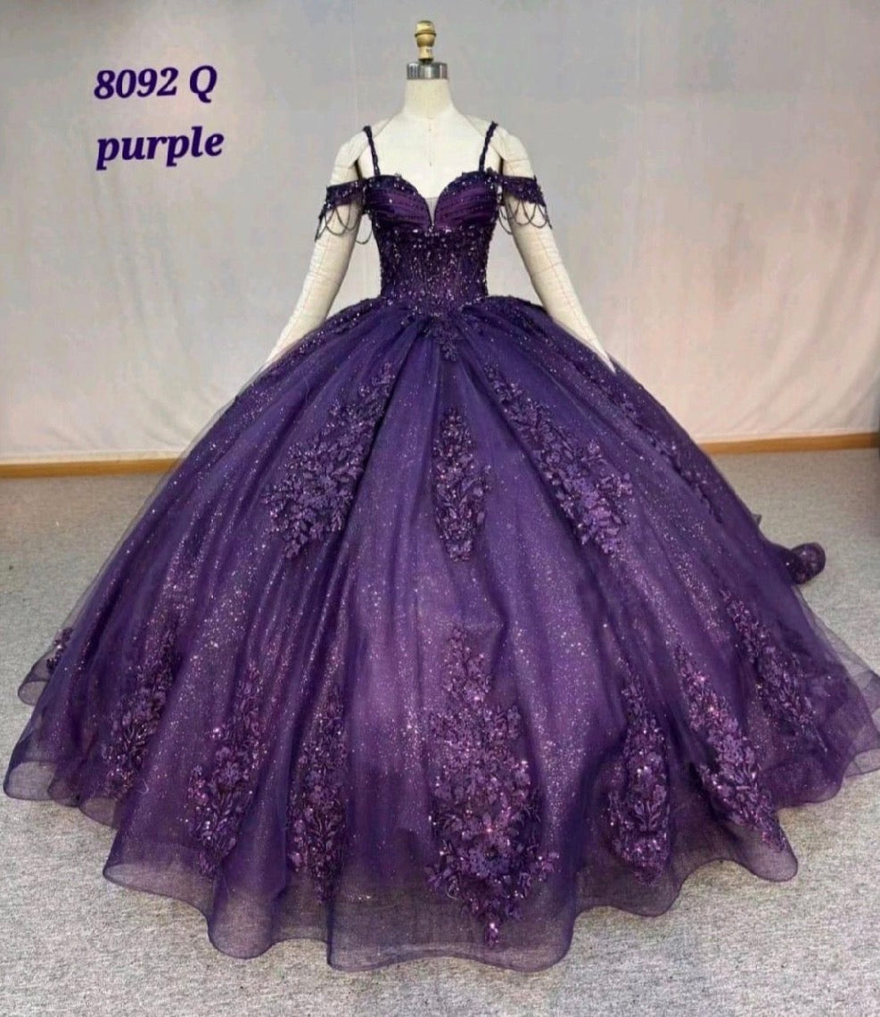 Ball gown is adorned with intricate bead and sequin. 8092Q BY LET´S CORP