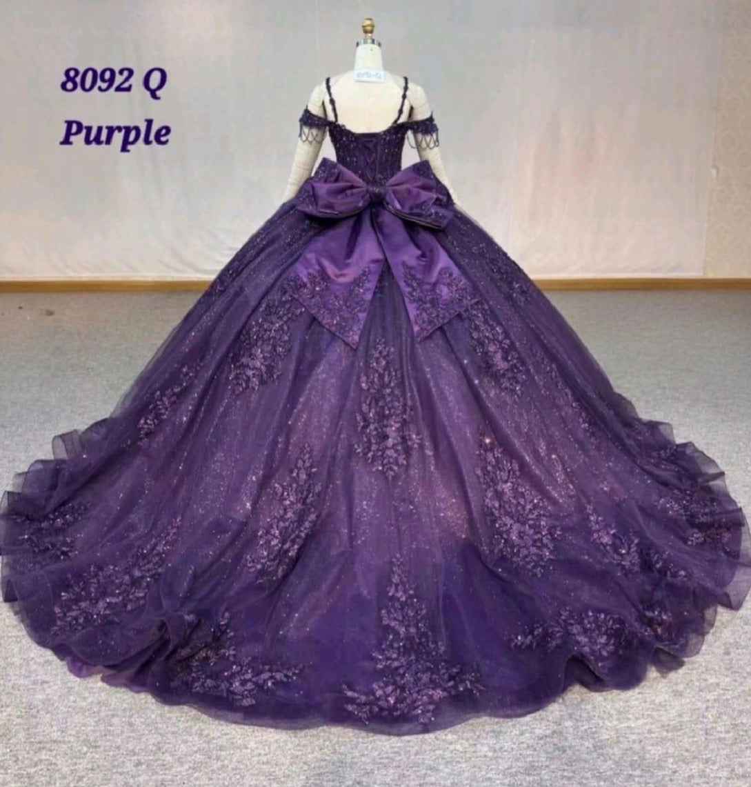 Ball gown is adorned with intricate bead and sequin. 8092Q BY LET´S CORP