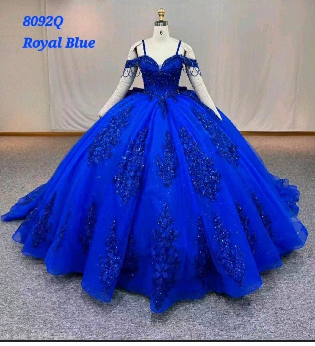 Ball gown is adorned with intricate bead and sequin. 8092Q BY LET´S CORP