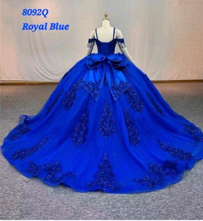 Ball gown is adorned with intricate bead and sequin. 8092Q BY LET´S CORP