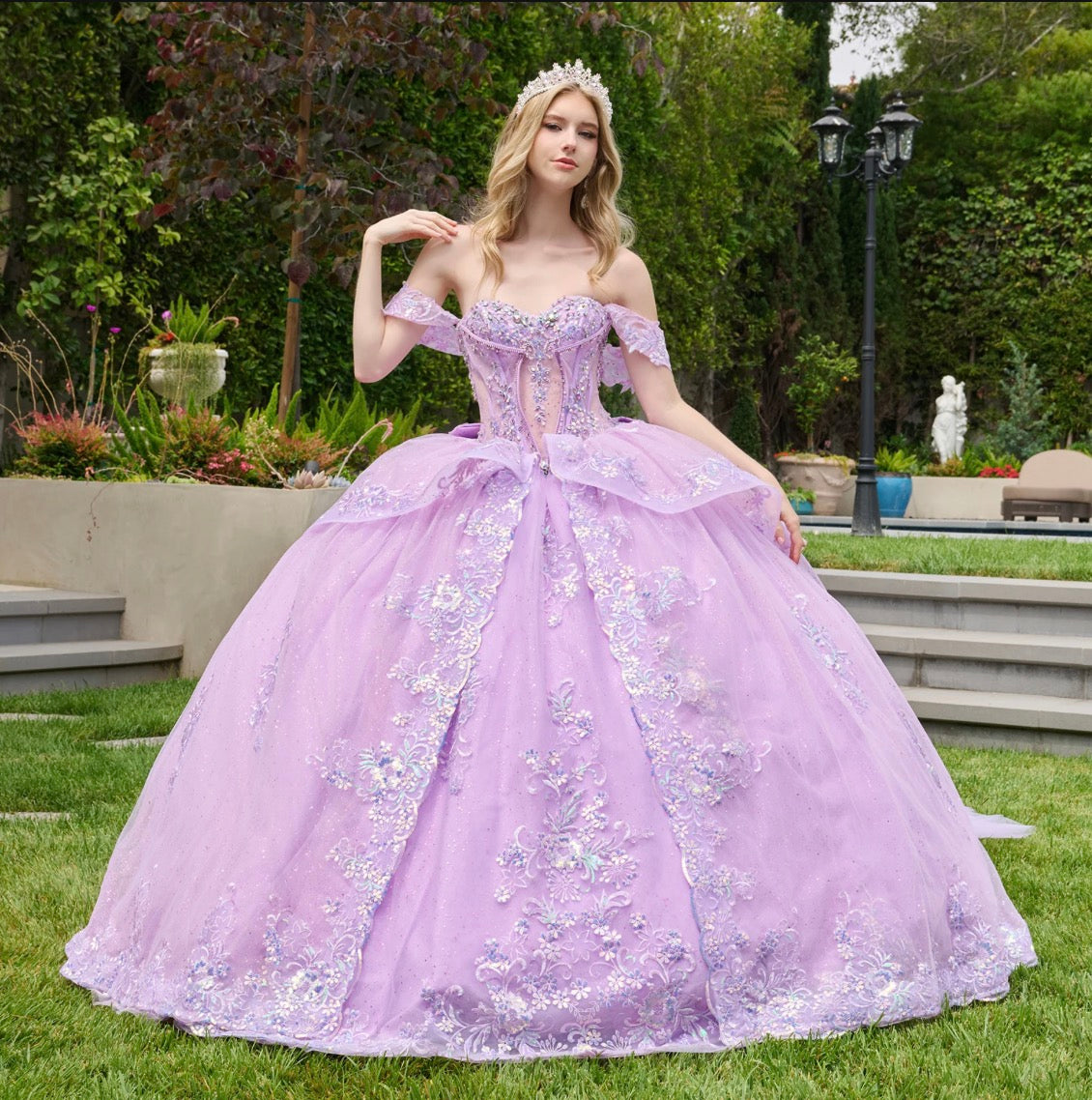 This ballgown is adorned with jewels, sequins, beads, and floral embroidery. GL3848 BY ELIZABETH K