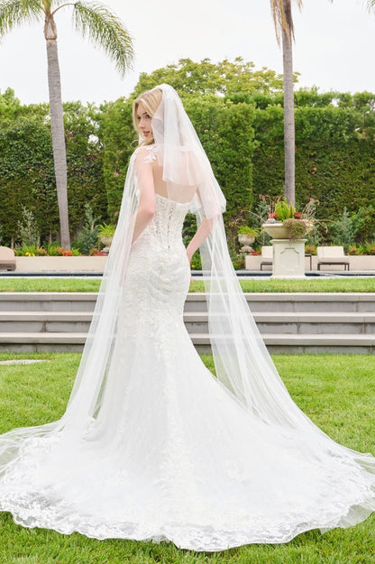 This wedding look features a strapless corset bodice with layered flaps on each side. GL3844 GLS BY GLORIA