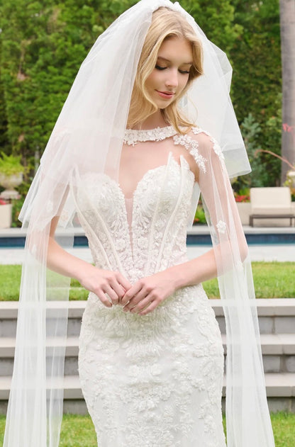 This wedding look features a strapless corset bodice with layered flaps on each side. GL3844 GLS BY GLORIA