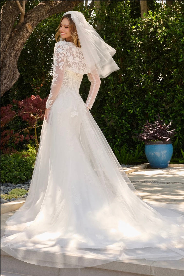 This two-in-one wedding look features a strapless fitted dress with a delicate lace underlayer.  GL3842 GLS BY GLORIA