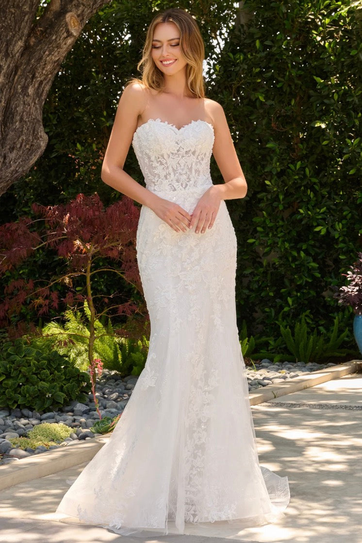 This two-in-one wedding look features a strapless fitted dress with a delicate lace underlayer.  GL3842 GLS BY GLORIA
