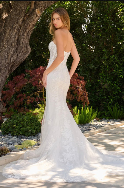 This two-in-one wedding look features a strapless fitted dress with a delicate lace underlayer.  GL3842 GLS BY GLORIA