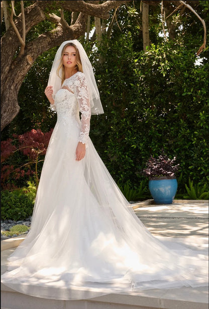 This two-in-one wedding look features a strapless fitted dress with a delicate lace underlayer.  GL3842 GLS BY GLORIA