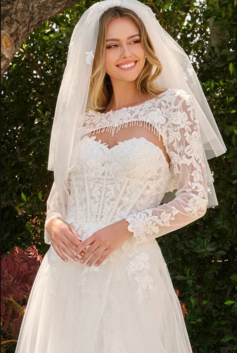 This two-in-one wedding look features a strapless fitted dress with a delicate lace underlayer.  GL3842 GLS BY GLORIA