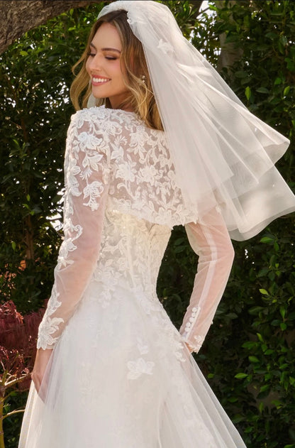 This two-in-one wedding look features a strapless fitted dress with a delicate lace underlayer.  GL3842 GLS BY GLORIA