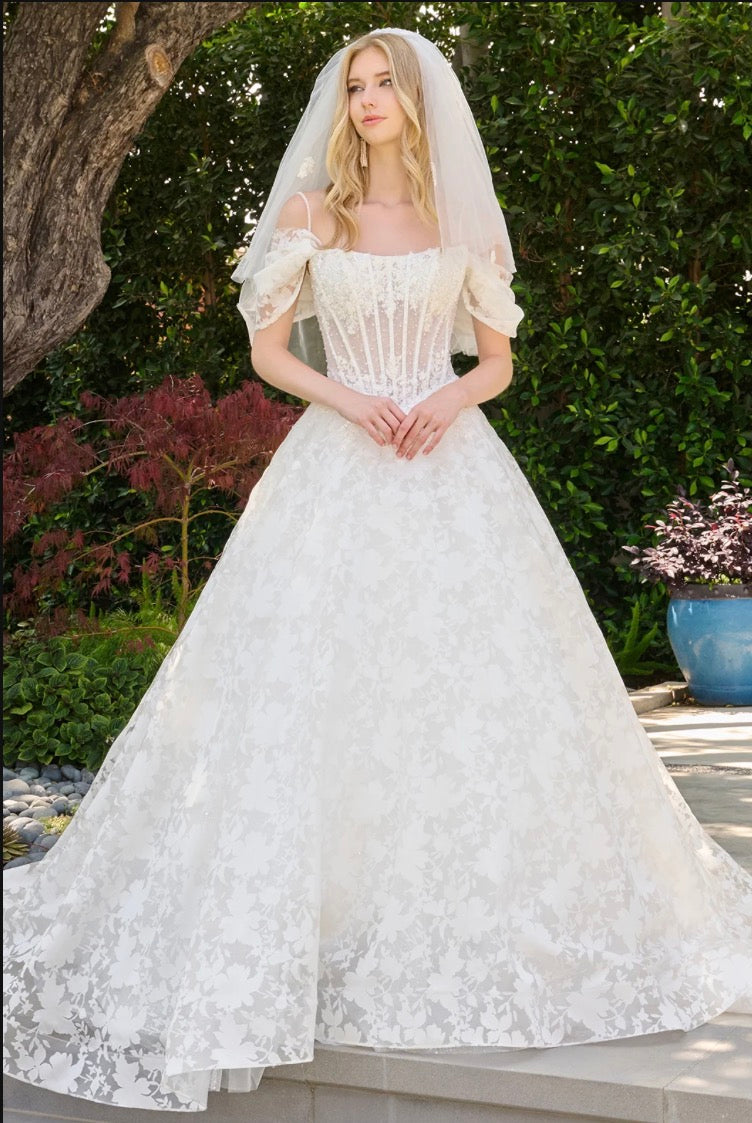 This boat neckline ballgown features a modern cold-shoulder. GL3840 GLS BY GLORIA