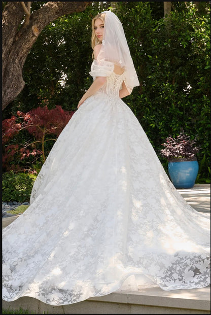 This boat neckline ballgown features a modern cold-shoulder. GL3840 GLS BY GLORIA