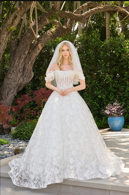 This boat neckline ballgown features a modern cold-shoulder. GL3840 GLS BY GLORIA