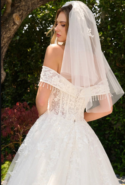 This wedding dress features a V-neckline that flows into fold-over off-the-shoulder straps. Gl3841 GLS BY GLORIA