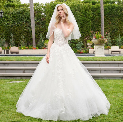 This wedding dress features straps that flow into a flattering sweetheart neckline.  GL3839 GLS BY GLORIA