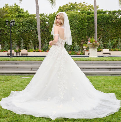 This wedding dress features straps that flow into a flattering sweetheart neckline.  GL3839 GLS BY GLORIA
