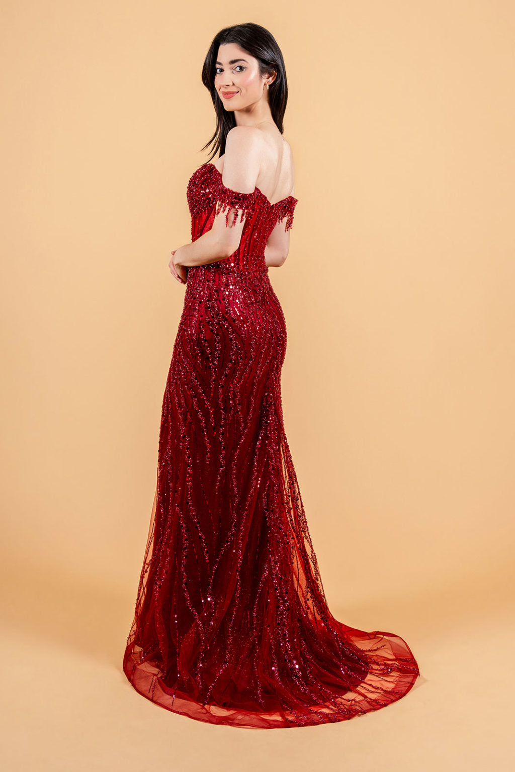 A large amount of beads and sequins decorate the corset bust and leads out  GL3620 GLS BY ELIZABETH K